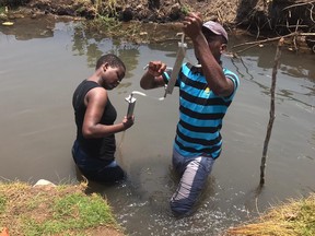 Master’s degree students Clarah Kimani and Karim Mtili from the University of Dar es Salaam performing geochemical sampling at Helium One's site in Tanzania's Rukwa basin in Feb. 2019. The site could yield the largest free-standing deposit of helium yet discovered, bolstering worldwide supplies of a valuable element