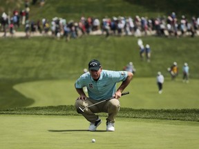 Jim Furyk lines up a putt on the 18th hole during the second round of the PGA Championship at Bethpage Black in Farmingdale, N.Y., Friday, May 17, 2019.