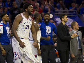 76ers’ Joel Embiid lets out a roar from the bench during Game 3 against the Raptors in Philadelphia. (GETTY IMAGES)