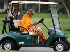 John Daly looks at his scorecard at the second hole during the first round of the Insperity Invitational at The Woodlands Country Club in The Woodlands, Texas, on May 3, 2019.