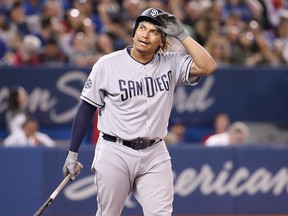 Josh Naylor of the San Diego Padres reacts after fouling off a pitch against the Toronto Blue Jays at Rogers Centre on May 24, 2019 in Toronto. (Tom Szczerbowski/Getty Images)
