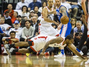 Raptors’ Kawhi Leonard loses the ball as he hits the Scotiabank Arena floor during Tuesday night’s Game 5 against the 76ers. Leonard managed just 21 points and 13 boards but, at last, got some help from his teammates in the blowout victory.  (ERNEST DOROSZUK/TORONTO SUN)