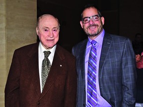 Steve Simmons poses with hockey legend Red Kelly at a function last November.  Chuck Kotchman photo