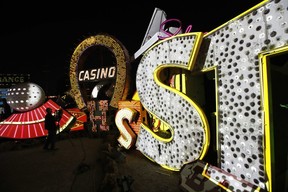 A videographer shoots video of an exhibit at the Neon Museum in Las Vegas. (AP Photo/John Locher)
