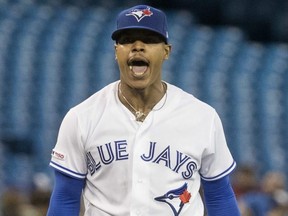 Blue Jays starting pitcher Marcus Stroman reacts after striking out Red Sox batter Xander Boaerts in the third inning of their MLB game in Toronto on Tuesday, May 21, 2019.