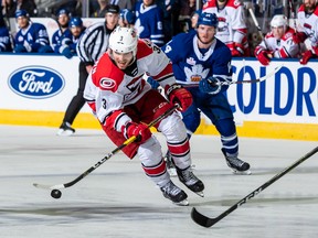 Charlotte Checkers’ Roland McKeown moves the puck down the ice against the Marlies last night. The Checkers won 4-1 to take a 3-2 lead in the series as it goes back to Charlotte for Game 6.  (Submitted photo)