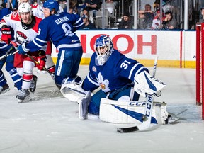 Michael Hutchinson makes a stop against the Charlotte Checkers in a 4-1 losing effort last night. (Submitted photo)