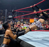 Ashley Massaro, right, in action. Her relationship with the WWE later soured. WWE