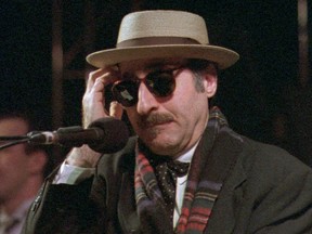 This March 28, 1998 file photo shows Leon Redbone performing at the eighth annual Redwood Coast Dixieland Jazz Festival in Eureka, Calif. (Patricia Wilson/The Times-Standard via AP, File)