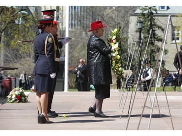 Lieut.-Governor of Ontario Elizabeth Dowdswell places a wreath at the 20th annual Ontario Police Memorial Foundation ceremony held at Queens Park honours the 266 officers who have fallen in the line of duty over the years on Sunday May 5, 2019. Jack Boland/Toronto Sun/Postmedia Network