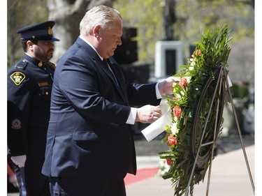 Ontario Premier Doug Ford places a wreath at the 20th annual Ontario Police Memorial Foundation ceremony held at Queens Park honours the 266 officers who have fallen in the line of duty over the years on Sunday May 5, 2019. Jack Boland/Toronto Sun/Postmedia Network