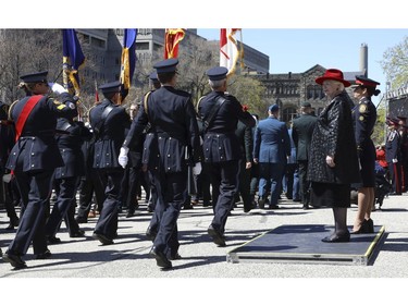 Lieut.-Governor of Ontario Elizabeth Dowdswell inspects the officers as they parade past at the end of the 20th annual Ontario Police Memorial Foundation ceremony held at Queens Park honours the 266 officers who have fallen in the line of duty over the years on Sunday May 5, 2019. Jack Boland/Toronto Sun/Postmedia Network