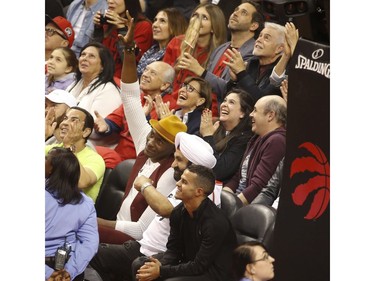 |Terrrel Owens acknowledges the crowd with Nav Bhatia "Superfan" during the first half  in Toronto, Ont. on Saturday May 25, 2019. Jack Boland/Toronto Sun/Postmedia Network