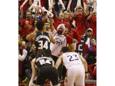 Toronto Raptors Superfan fan Nav Bhatia tries to distract Milwaukee Bucks Giannis Antetokounmpo PF (34) from shooting free throws during third quarter in Toronto, Ont. on Saturday May 25, 2019. Jack Boland/Toronto Sun/Postmedia Network