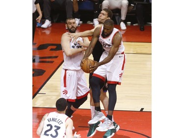 Toronto Raptors Serge Ibaka C (9) steals  a rebound with teammate Marc Gasol C (33) during the first half  in Toronto, Ont. on Saturday May 25, 2019. Jack Boland/Toronto Sun/Postmedia Network