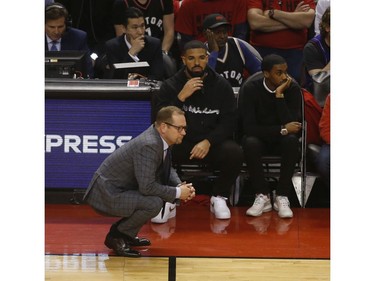 Toronto Raptors coach Nick Nurse in from of Drake during the first half  in Toronto, Ont. on Saturday May 25, 2019. Jack Boland/Toronto Sun/Postmedia Network