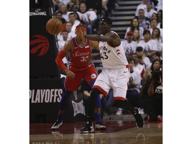 Toronto Raptors Pascal Siakam PF (43) passes the ball past Philadelphia 76ers Tobias Harris SF (33) during the first half in Toronto, Ont. on Sunday May 12, 2019. Jack Boland/Toronto Sun/Postmedia Network