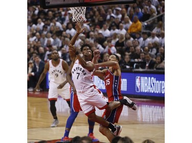 Toronto Raptors Kyle Lowry PG (7) tires to make the basket against Philadelphia 76ers Ben Simmons PG (25) during the first half in Toronto, Ont. on Sunday May 12, 2019.