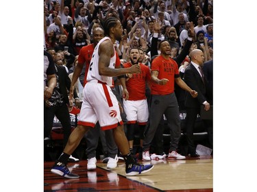 Toronto Raptors Kawhi Leonard SF (2) is congratulated by the bench in the fourth quarter in Toronto, Ont. on Sunday, May 12, 2019