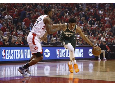 Toronto Raptors Kawhi Leonard SF (2) defends against Milwaukee Bucks Giannis Antetokounmpo PF (34) during first quarter in Toronto, Ont. on Sunday May 19, 2019. Jack Boland/Toronto Sun/Postmedia Network