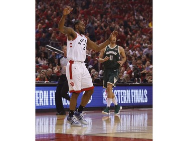 Toronto Raptors Kawhi Leonard SF (2) limps up the court after rolling his ankle with the referee during first quarter in Toronto, Ont. on Sunday May 19, 2019. Jack Boland/Toronto Sun/Postmedia Network