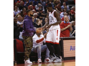 Drake shakes hands with Toronto Raptors Pascal Siakam PF (43) during fourth quarter in Toronto, Ont. on Sunday May 19, 2019. Jack Boland/Toronto Sun/Postmedia Network