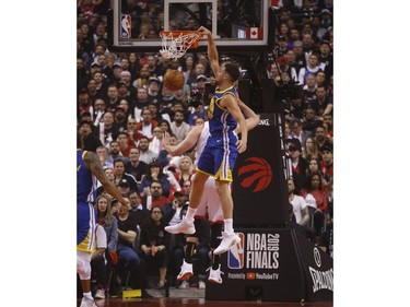 Golden State Warriors Klay Thompson SG (11) jams a ball during the first half media in Toronto, Ont. on Thursday May 30, 2019. Jack Boland/Toronto Sun/Postmedia Network