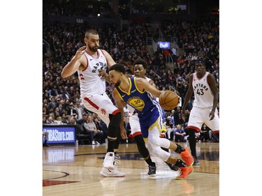 Golden State Warriors Stephen Curry PG (30) drives in on Toronto Raptors Marc Gasol C (33) during the third quarter in Toronto, Ont. on Thursday May 30, 2019. Jack Boland/Toronto Sun/Postmedia Network