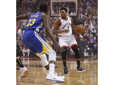 Toronto Raptors Kyle Lowry PG (7) looks to get past Golden State Warriors Draymond Green PF (23) during the first half media in Toronto, Ont. on Thursday May 30, 2019. Jack Boland/Toronto Sun/Postmedia Network