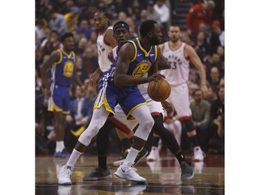 Golden State Warriors Draymond Green PF (23) goes past Toronto Raptors Pascal Siakam PF (43) during the first half media in Toronto, Ont. on Thursday May 30, 2019. Jack Boland/Toronto Sun/Postmedia Network