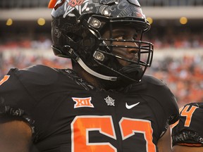 Oklahoma State offensive lineman Shane Richards walks the field prior to an NCAA college football game in Stillwater, Okla., Saturday, Sept. 8, 2018. The Toronto Argonauts are expected to take Richards first overall in the CFL Draft Thursday night.