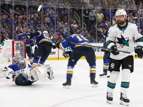 San Jose Sharks defenceman Erik Karlsson, of Sweden, skates away after scoring the winning goal past St. Louis Blues goaltender Jordan Binnington, left, during overtime in Game 3 of the Stanley Cup Western Conference final series Wednesday, May 15, 2019, in St. Louis.