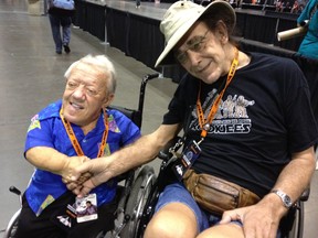 The late Kenny Baker (left), who played R2-D2 in the original the Star Wars movies, is seen in this 2016 with recently deceased Peter Mayhew, who played Chewbacca. (photo by Roger Christian)