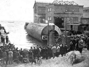 This rare image of the Roller Boat was featured in an 1897 edition of Harper's Magazine. The curious crowd is gathered at the north end of what back then was the location of the Sherbourne St. Slip. The two buildings in the photo can be identified on the map that was prepared by Archaeological Services Inc. and accompanies this column. Today the former slip has been backfilled and is covered by portions of the cross-waterfront railway viaduct, Queen's Quay E. and Lower Sherbourne St. south to Toronto Bay.