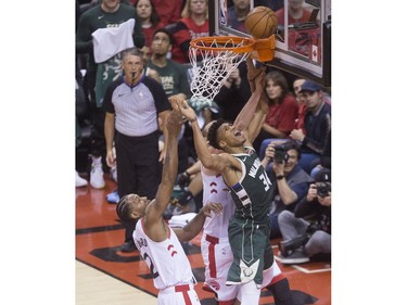 Giannis Antetokounmpo gets stymied by the Raptors at the net in the 4th quarter action in Game 3 of the Eastern Conference Finals as the Toronto Raptors go on to beat the Milwaukee Bucks,  in Toronto, Ont. on Sunday May 19, 2019. Stan Behal/Toronto Sun/Postmedia Network