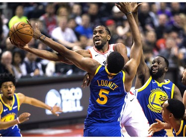 Kawhi Leonard in action in 2nd quarter action as the Toronto Raptors lead the Golden State Warriors in Game 1 of the NBA Finals in Toronto. on Friday May 31, 2019. Stan Behal/Toronto Sun/Postmedia Network   Stan Behal ORG XMIT: POS1905302151080219