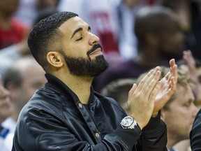 Rapper Drake, a global ambassador for the Toronto Raptors, watches playoff action against the Cleveland Cavaliers at the Air Canada Centre at the Air Canada Centre in Toronto, Ont. on Tuesday May 1, 2018. Ernest Doroszuk/Toronto Sun/Postmedia Network