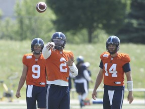 James Franklin (2), the presumptive starting QB of the Argos in 2019, unloads the ball during last year’s camp while Dakota Prukup (9) and McLeod Bethel-Thompson look on.   Jack Boland/Toronto Sun