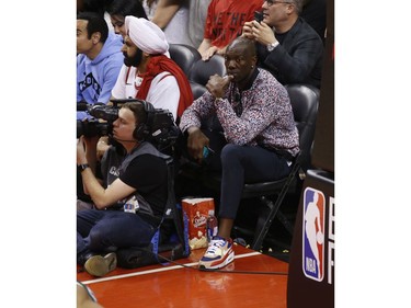 NFLer Terrell Owens (R) sits with Superfan Nav Bhatia during the second half in Toronto, Ont. on Tuesday May 21, 2019. Jack Boland/Toronto Sun/Postmedia Network