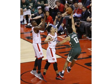 Toronto Raptors Danny Green SG (14) swats away a ball from Milwaukee Bucks Malcolm Brogdon during the second half in Toronto, Ont. on Tuesday May 21, 2019. Jack Boland/Toronto Sun/Postmedia Network