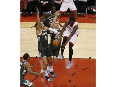 Toronto Raptors Pascal Siakam PF (43) loses the ball against Milwaukee Bucks D.J. Wilson PF (5) during the second half in Toronto, Ont. on Tuesday May 21, 2019. Jack Boland/Toronto Sun/Postmedia Network