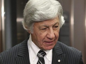 Dr. Norman Barwin is pictured at a disciplinary hearing in January 2013.
