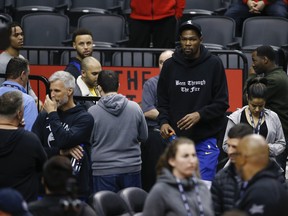 Golden State Warriors' Kevin Durant (right) practised with the team on Sunday. (JACK BOLAND/Toronto Sun)