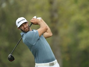 Dustin Johnson of the United States plays a shot from the 12th tee during the final round of the 2019 PGA Championship at the Bethpage Black course on May 19, 2019 in Farmingdale, New York.