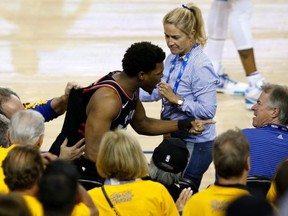 Kyle Lowry #7 of the Toronto Raptors yells at a fan in the second half against the Golden State Warriors during Game Three of the 2019 NBA Finals at ORACLE Arena on June 05, 2019 in Oakland, California.
