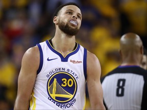 OAKLAND, CALIFORNIA - JUNE 05:  Stephen Curry #30 of the Golden State Warriors reacts late in the game against the Toronto Raptors during Game Three of the 2019 NBA Finals at ORACLE Arena on June 05, 2019 in Oakland, California. NOTE TO USER: User expressly acknowledges and agrees that, by downloading and or using this photograph, User is consenting to the terms and conditions of the Getty Images License Agreement. (Photo by Ezra Shaw/Getty Images)