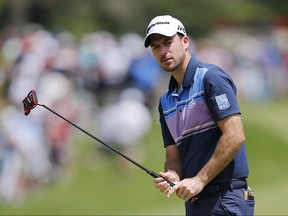 Nick Taylor of Canada reacts after a putt on the first green during the final round of the RBC Canadian Open at Hamilton Golf and Country Club on June 09, 2019 in Hamilton, Canada.