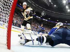 David Pastrnak #88 of the Boston Bruins scores a third period goal past Jordan Binnington #50 of the St. Louis Blues in Game Six of the 2019 NHL Stanley Cup Final at Enterprise Center on June 09, 2019 in St Louis, Missouri. (Photo by Bruce Bennett/Getty Images)