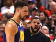 Drake reacts in the first half during Game Five of the 2019 NBA Finals between the Golden State Warriors and the Toronto Raptors at Scotiabank Arena on June 10, 2019 in Toronto, Canada. NOTE TO USER: User expressly acknowledges and agrees that, by downloading and or using this photograph, User is consenting to the terms and conditions of the Getty Images License Agreement.