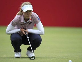 Brooke Henderson of Canada lines up a putt on the 18th hole during the second round of the Meijer LPGA Classic at Blythefield Country Club on June 14, 2019 in Grand Rapids, Michigan.